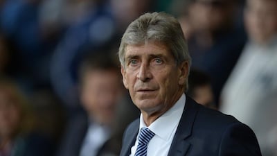 Manuel Pellegrini said Sergio Aguero is available for selection but the Liverpool fixture has come too early for David Silva. Oli Scarff / AFP
