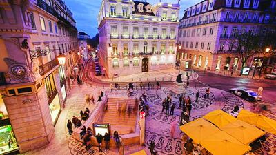 The centre of Lisbon thrives at night, including the Rua Garrett, which is filled with museums, shops, eateries and cafes. Getty Images