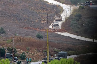Israeli forces advance towards a newly established Lebanese army position on the outskirts of Deir Mimas in southern Lebanon. AFP