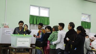 Kachin ethnic people wait to cast their votes at a polling station of Myit Kyee Na township in Kachin State, northern Myanmar, on November 8 2015 as Myanmar held the first general elections in 25 years. Seng Mai/EPA