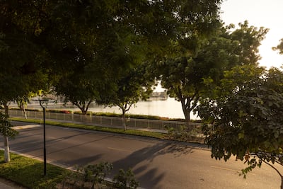 The three-bedroom villa has an uninterrupted view of a lake. Antonie Robertson / The National