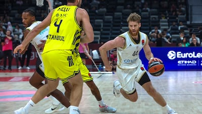Thomas Walkup of Dubai Basketball in action.