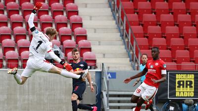 RB Leipzig's Timo Werner, centre, in action with Mainz's Moussa Niakhate. EPA