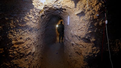 A Hizbollah member walks in the big cave of Al-Nusra terrorist groups in a mountainous area in Juroud of Arsal at the Lebanese -Syrian border. Nabil Mounzer.