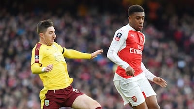 Arsenal's Alex Iwobi controls the ball against Burnley on Saturday in his team's FA Cup match. Facundo Arrizabalaga / EPA