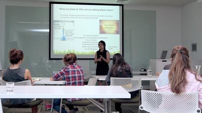 Teenagers attending a TalkShop UAE workshop. Jeffrey E Biteng / The National