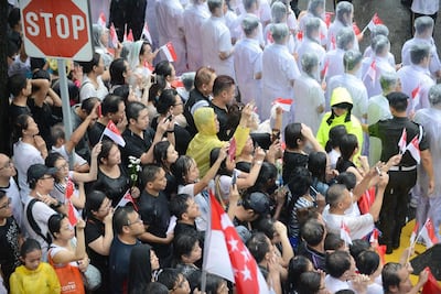 Lee Kuan Yew's death prompted a week of national mourning with 450,000 people lining the streets and a million people visiting tribute sites. Mohd Fyrol / AFP