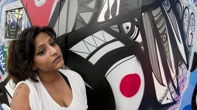 Fathima Mohiuddin with her New York mural. Courtesy Ernie Paniccioli