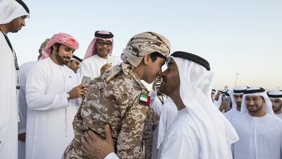 Sheikh Mohammed bin Zayed greets a guest at Wahat Al Karama. Ryan Carter / Crown Prince Court - Abu Dhabi