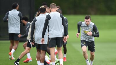 Liverpool full-back Andrew Robertson begins to sprint at training. Getty