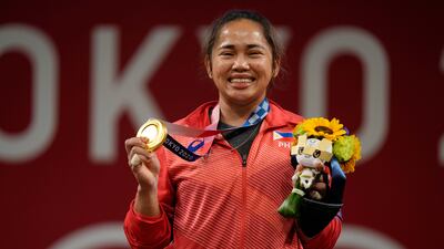 Hidilyn Diaz of Philippines after winning the gold medal in the women's 55kg weightlifting event, at the 2020 Summer Olympics in Tokyo. AP