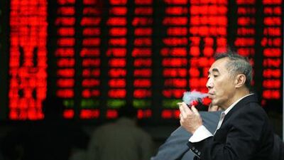 Shares traded in the Shanghai stock exchange, designated for purchase by local Chinese only, have declined in the past two years. AP Photo