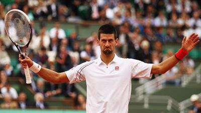 Novak Djokovic acknowledges the crowd after his win against Jo-Wilfried Tsonga.