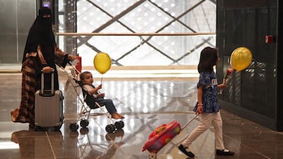 Saudi passengers walk through Makkah station's concourse. AFP