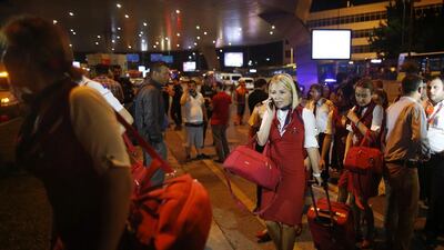 Members of a flight crew leave Istanbul’s Ataturk airport. Though there was no immediate claim of responsibility for Tuesday’s carnage, “the evidence points to Daesh”, prime minister Binali Yildirim said at the scene. Emrah Gurel / AP Photo