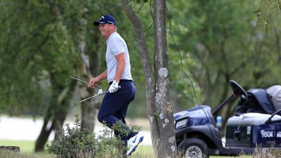England's Callum Shinkwin after breaking his club playing a shot around a tree during Day 3 of the Hero Open. PA