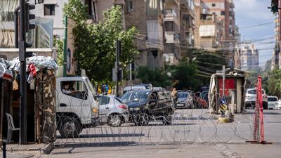 Lebanese army blocks a road by barbed wire that leads to the Ain El Rumaneh neighbourhood after the deadly clashes that erupted this month between Muslim Shiite and Christian areas, in Beirut. The shootout on the streets of Beirut between rival Christian and Muslim groups has revived memories of the country's 1975-90 civil war and fired up sectarian passions in a country that never dealt with the causes of its violent past. AP