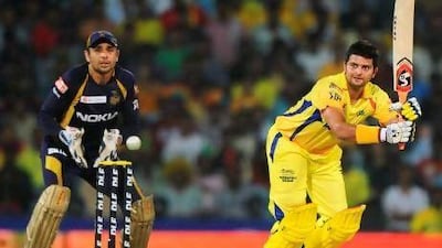 Chennai Super Kings batsman Suresh Raina is wathched by Kolkata Knight Riders wicketkeeper Manvinder Bisla as he plays a shot during the IPL final. Dibyangshu Sarkar / AFP