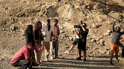 Abdullah Bin Haider, centre, films a scene for Emirati supernatural series Kaa’inaat, shot in Ras Al Khaimah and Fujairah. Photo: Starzplay