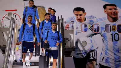 Argentina forward Lionel Messi, second right, and teammates arrive at the Hamad International Airport in Doha on November 17, 2022, ahead of the Qatar 2022 World Cup. AFP