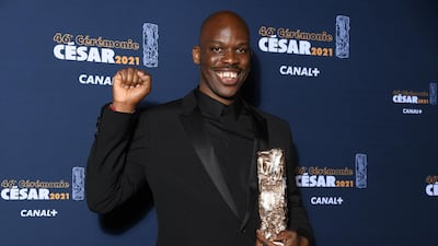 Actor Jean-Pascal Zadi poses during a photocall after receiving the Best Male Newcomer Award for his role in the film 'Tout simplement noir' ( (Simply Black) during the 46th Cesar Awards ceremony at the Olympia concert hall in Paris, France. Reuters