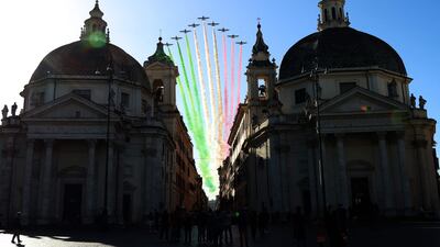 The Italian Air Force aerobatic unit Frecce Tricolori over Piazza de Popolo in Rome during celebrations of National Unity and Armed Forces Day. AFP