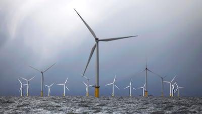 Hydrogen is classed as green when it is produced from water using renewable energy sources such as wind turbines. AFP