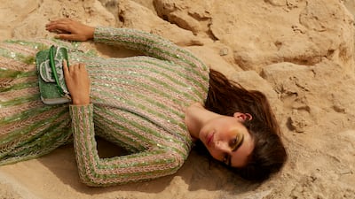Beaded dress, Dh51,000; and Loco bag, Dh13,800, both by Valentino