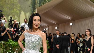 Michelle Yeoh wears Balenciaga. AFP