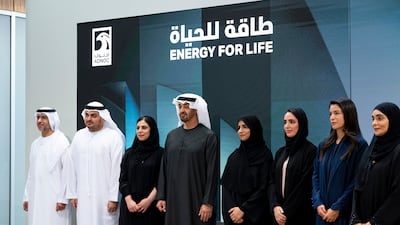 Sheikh Mohamed with Adnoc employees