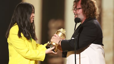 Awkwafina presents actor Jack Black with the Comedic Genius Award. AFP