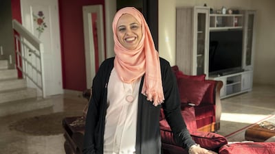 Cancer survivor Maysa, pictured at her home in Abu Dhabi, says doctors repeatedly ignored her complaints about blood in her breast milk. It was only when she sought another opinion and insisted on a mammogram that her tumour was discovered. Antonie Robertson / The National