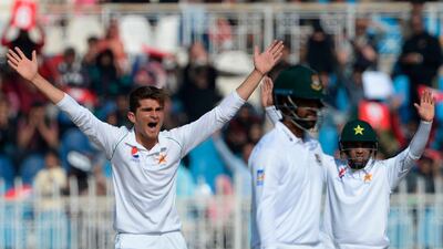 Pakistan's Shaheen Shah Afridi, left, appeals during the third day of the first Test. AFP