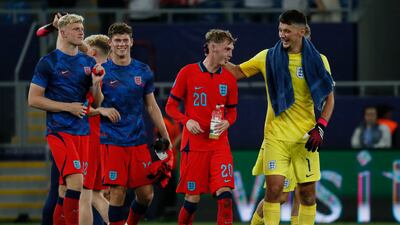 England goalkeeper James Trafford, right, and Cole Palmer, centre, England celebrate after winning their Uefa Under-21 Championship semi-final against Israel in Batumi, Georgia. EPA
