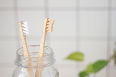 Bamboo toothbrushes are a great option to replace plastic. Unsplash