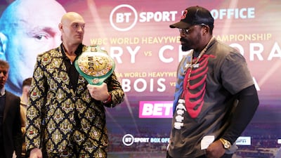 WBC champion Tyson Fury with challenger Derek Chisora at Tottenham Hotspur Stadium on December 1, 2022, ahead of their heavyweight showdown on December 3. Getty