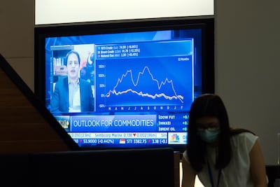 A screen showing market news at the Singapore Exchange Ltd. (SGX) headquarters in Singapore. Getty Images