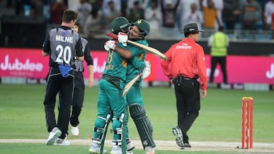 Mohammed Hafeez, left, and Safraz Ahmed celebrate after Pakistan beat New Zealand in Dubai. AFP