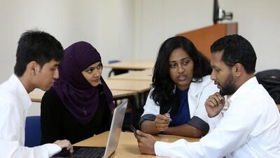 Fauzan Sudradjat, Nilufa Hoque, Lorain Manoj and Abdush Shakoor, students from the University of Wollongong in Dubai, have developed a learning app for children. Pawan Singh / The National
