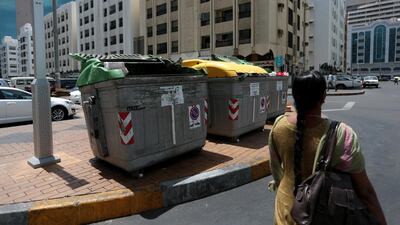 Open trash bins near the Etisalat building off Electra street in Abu Dhabi. Christopher Pike / The National