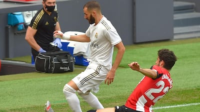 Real Madrid forward Karim Benzema challenges Athletic Bilbao's Raul Garcia. AFP