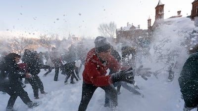 Snow flies during a snowball fight organised by the DC Snowball Fight Association on the National Mall. AP