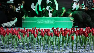 Mourners gathering around the coffin of Iran's former supreme leader Ayatollah Ali Khamenei at a funeral ceremony in Tehran. AFP