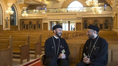 Father Antonios and Father Bishoy, both priests at St Antony Coptic Orthodox Cathedral in Abu Dhabi. Silvia Razgova / The National