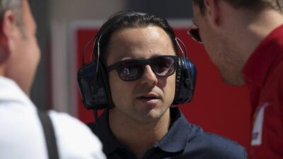 Felipe Massa, centre, has joined Williams from Ferrari for the 2014 season. Hasan Jamali / AP