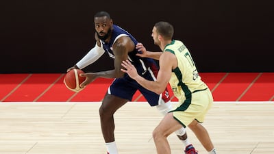 LeBron James of USA takes on Jack McVeigh of Australia.
