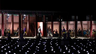 The Italian luxury label took over the 14th-century Seoul palace to showcase its cruise collection, blending Korean heritage and modern fashion. AP