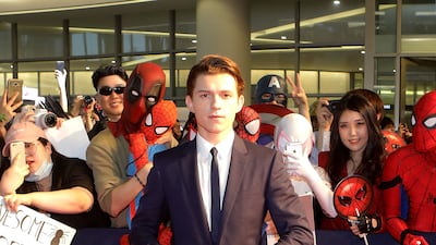 Tom Holland, in a black suit with a skinny tie, attends the 'Spider-Man: Homecoming' Seoul premiere on July 2, 2017 in South Korea. Getty Images