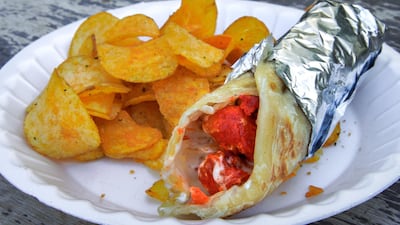 Rashid Ali Hassan Cafeteria in Abu Dhabi is known for its classic Chips Oman parotta. Victor Besa / The National