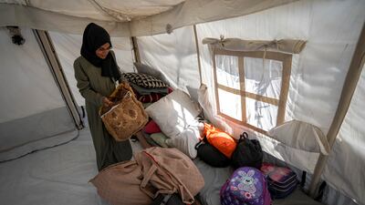 Palestinians who fled south are now packing belongings in preparation to head north at the weekend. AP